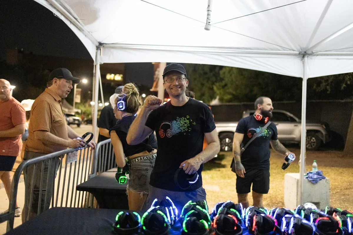 The ASD crew behind the headphone table, all smiles