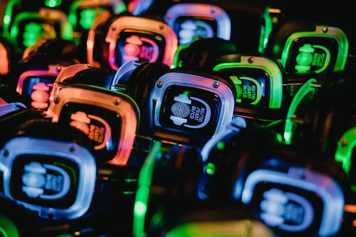 The wireless headphones, brand and channel colors lit